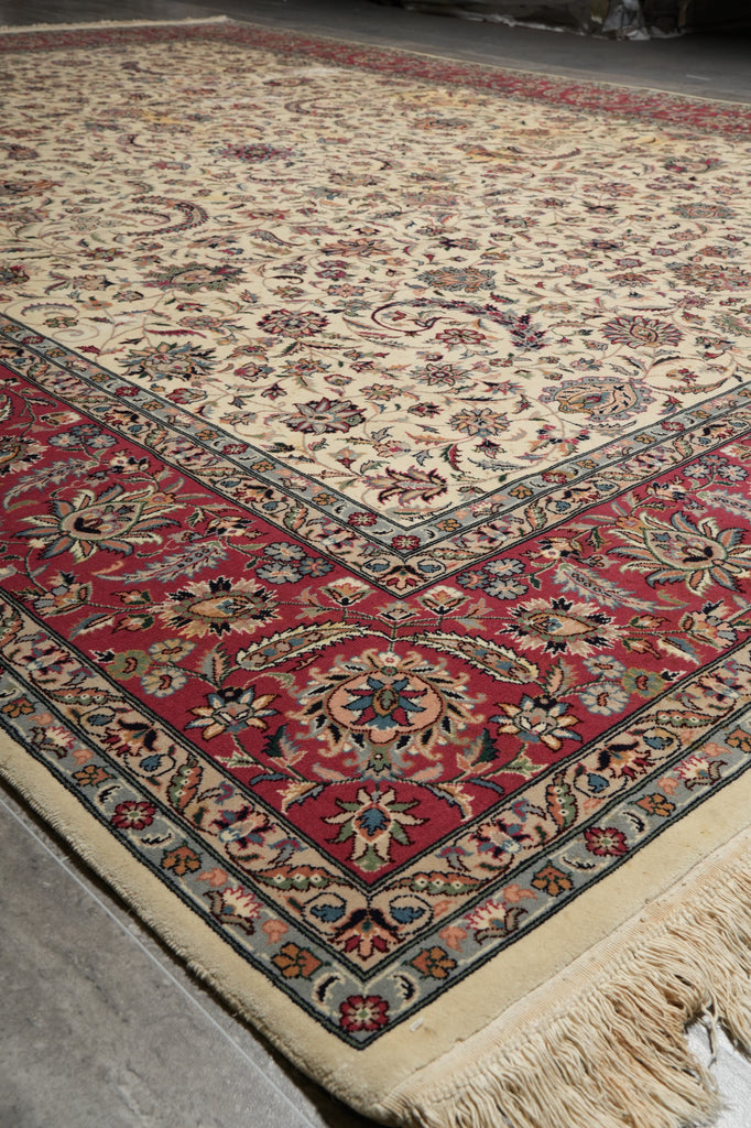 Decorative rug with intricate patterns and colors on a plain background