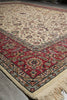 Load image into Gallery viewer, Decorative rug with intricate patterns and colors on a plain background