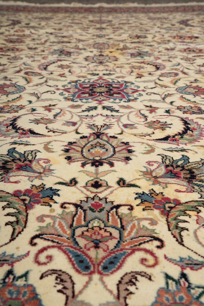 Close-up of a patterned rug with intricate designs.