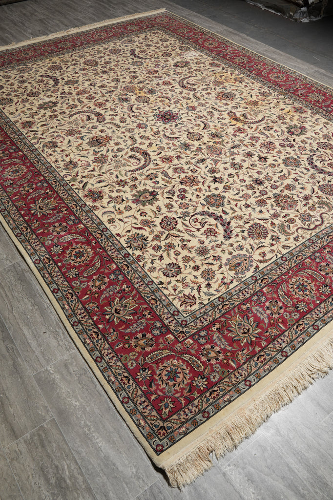 Decorative rug with intricate patterns on a wooden floor