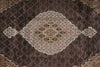 Load image into Gallery viewer, Close-up of a patterned rug with intricate designs.