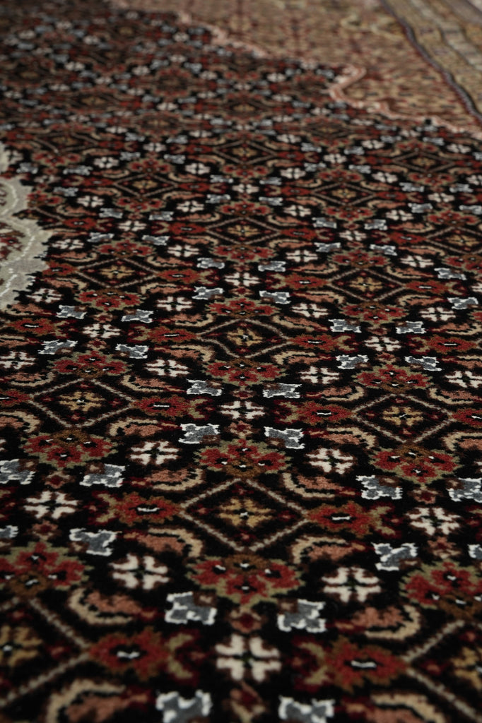 Close-up of a patterned fabric with intricate designs.