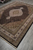 Load image into Gallery viewer, Decorative rug with intricate patterns on a wooden floor