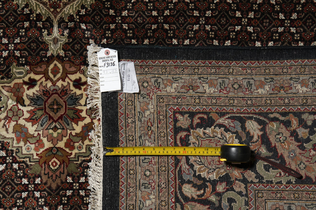 Decorative rug with a measuring tape and price tag on a black surface