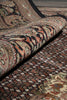Load image into Gallery viewer, Close-up of patterned rugs with intricate designs on a wooden floor.