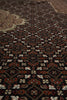 Load image into Gallery viewer, Close-up of a patterned rug with intricate designs.