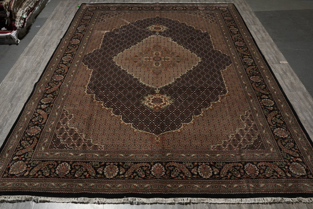 Decorative rug with intricate patterns on a plain floor.