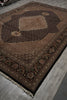 Load image into Gallery viewer, Decorative brown rug with intricate patterns on a gray floor.