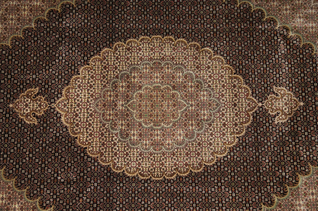 Close-up of a patterned rug with intricate design