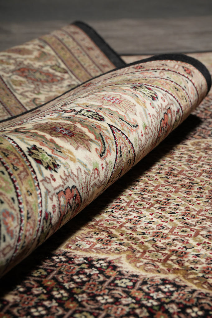 Close-up of a patterned fabric with intricate designs.
