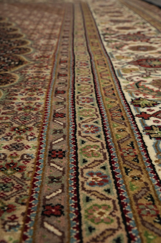 Close-up of a patterned rug with intricate designs.