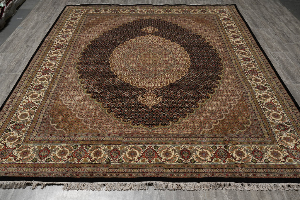 Decorative rug with intricate patterns on a wooden floor