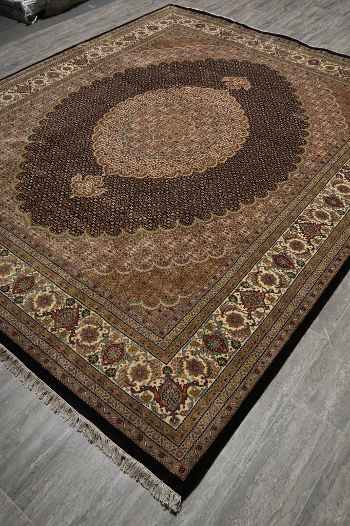 Decorative rug with intricate patterns on a wooden floor