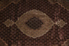 Load image into Gallery viewer, Close-up of a patterned rug with intricate designs.