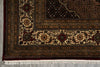 Load image into Gallery viewer, Close-up of an intricately designed rug with detailed patterns on a gray floor.