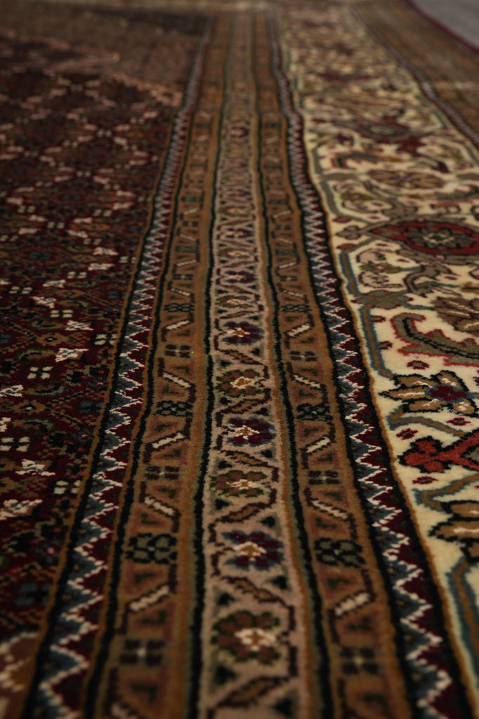 Close-up of a patterned rug with intricate designs.