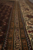 Load image into Gallery viewer, Close-up of a patterned rug with intricate designs.
