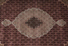 Load image into Gallery viewer, Close-up of a patterned rug with intricate designs