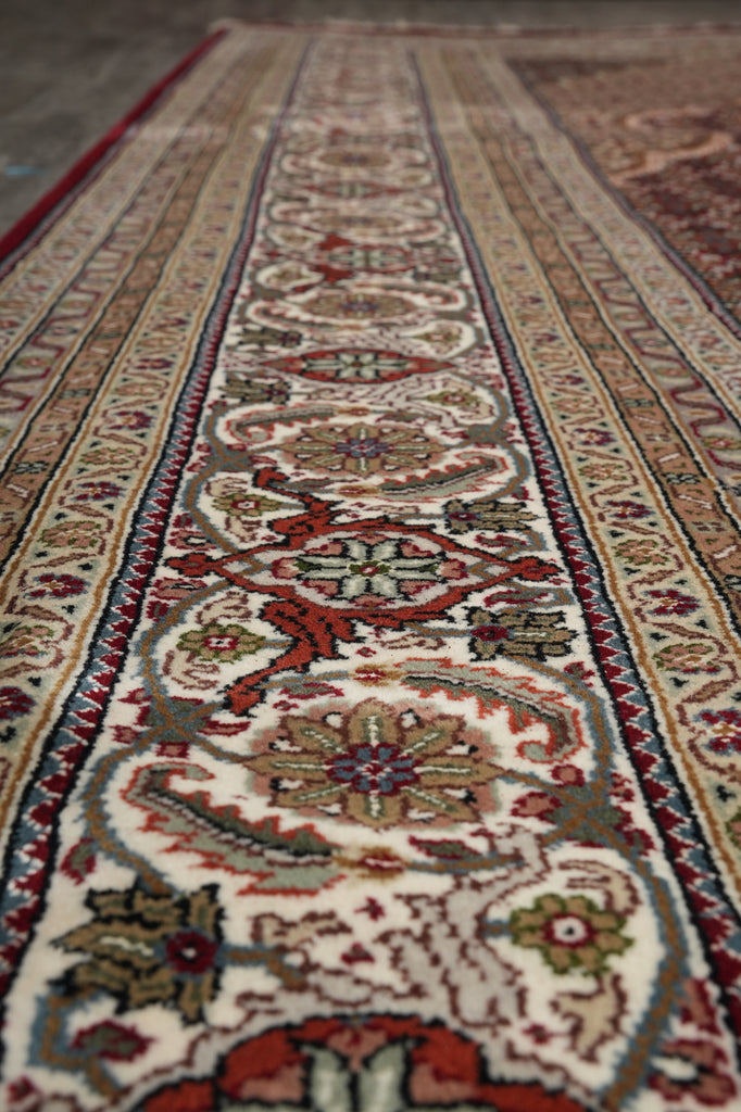 Close-up of a patterned rug with intricate designs.