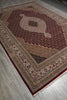 Load image into Gallery viewer, Decorative rug with intricate patterns on a wooden floor