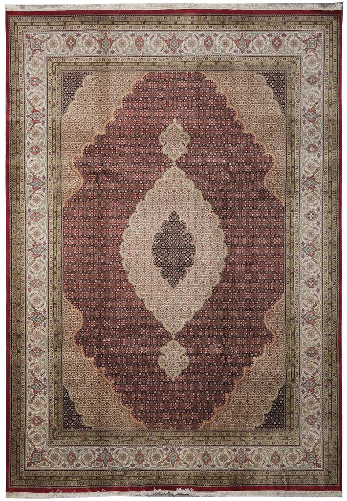 Decorative rug with intricate patterns on a plain background