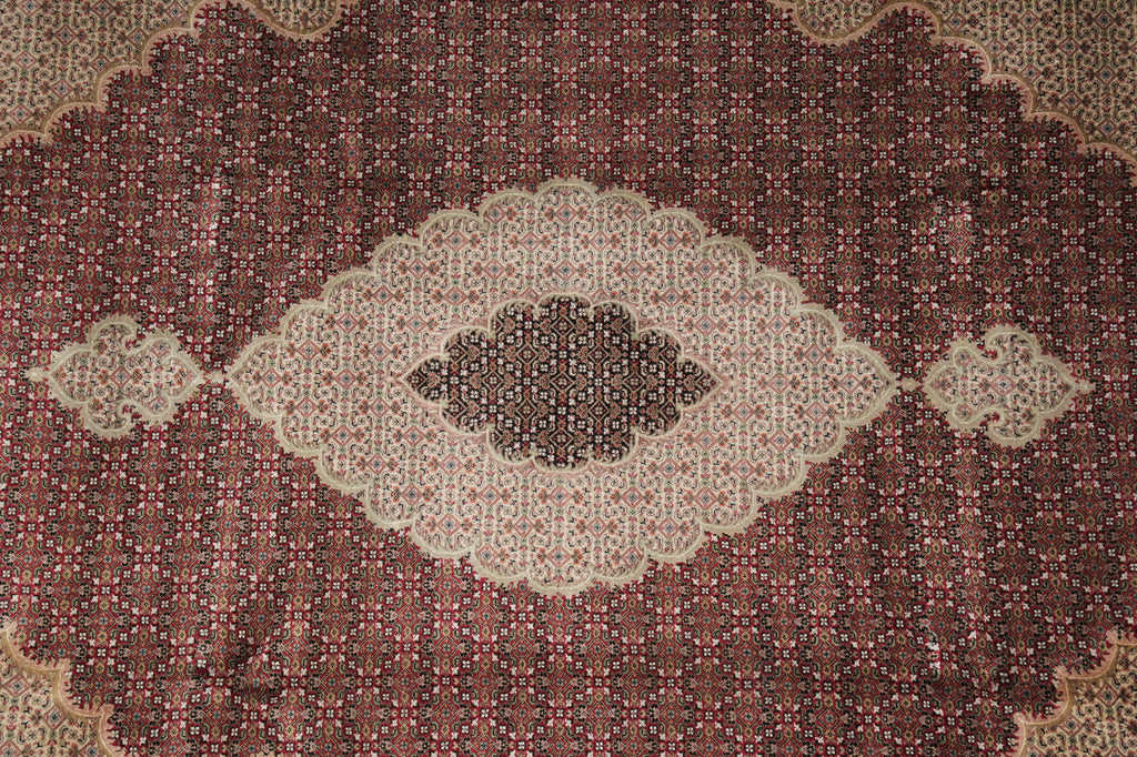 Close-up of a patterned rug with intricate designs
