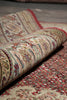 Load image into Gallery viewer, Close-up of a patterned rug with intricate designs.