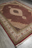 Load image into Gallery viewer, Decorative rug with intricate patterns on a wooden floor