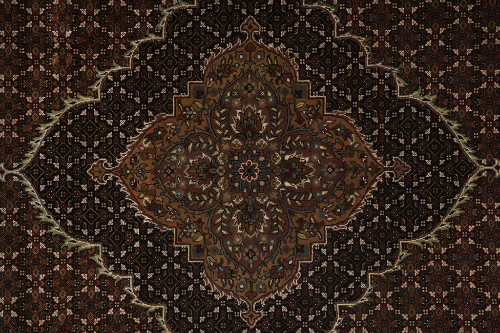 Close-up of a patterned rug with intricate design