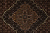 Load image into Gallery viewer, Close-up of a patterned rug with intricate design