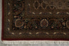 Load image into Gallery viewer, Close-up of an ornate rug with intricate patterns on a gray floor.