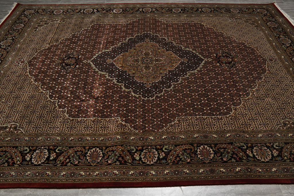 Decorative rug with intricate patterns on a plain background