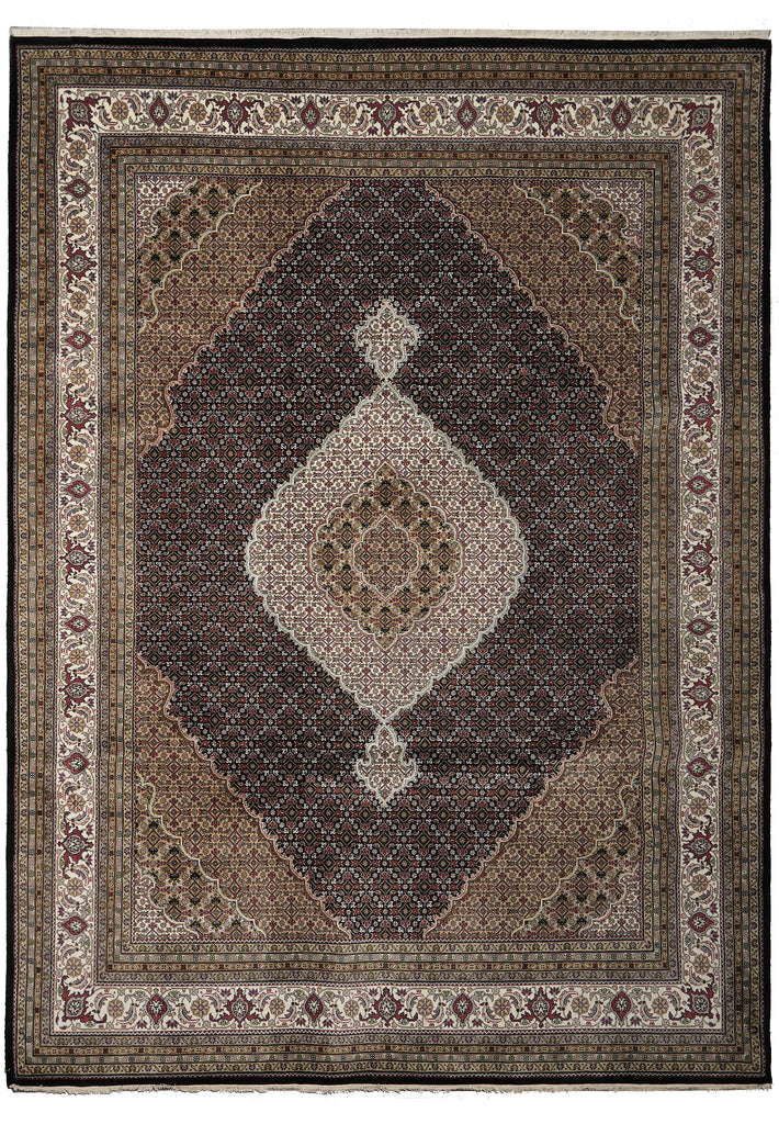 Decorative rug with intricate patterns and a central diamond design on a brown background.