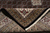 Load image into Gallery viewer, Close-up of patterned rugs with intricate designs.
