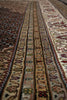 Load image into Gallery viewer, Close-up of a patterned rug with intricate designs.