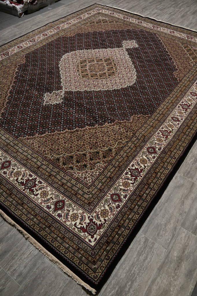 Decorative rug with intricate patterns on a wooden floor