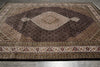 Load image into Gallery viewer, Decorative rug with intricate patterns on a wooden floor
