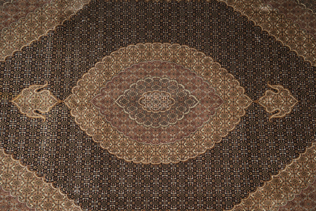 Close-up of a patterned rug with intricate designs.