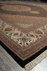 Load image into Gallery viewer, Close-up of a patterned rug with intricate designs on a textured surface.