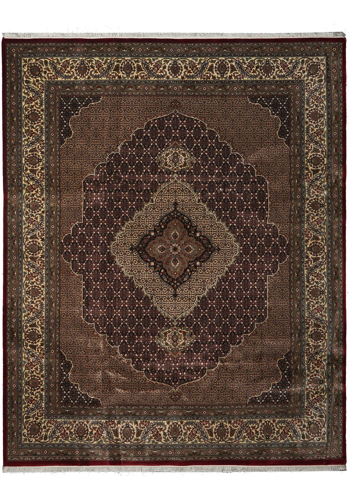 Decorative rug with intricate patterns on a plain background