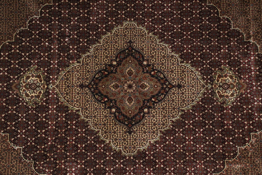 Close-up of a patterned rug with intricate designs