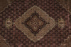 Load image into Gallery viewer, Close-up of a patterned rug with intricate designs