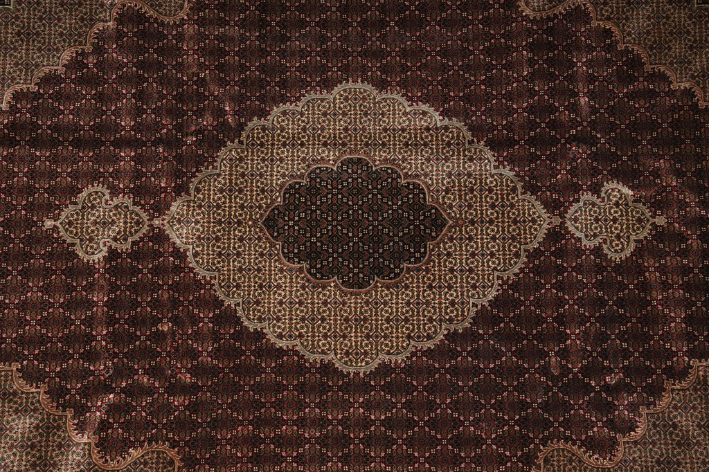 Close-up of a patterned rug with intricate designs.
