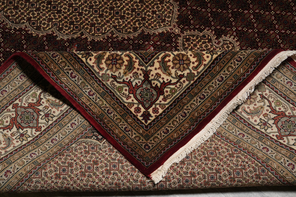 Close-up of a patterned rug with intricate designs