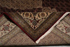 Load image into Gallery viewer, Close-up of a patterned rug with intricate designs