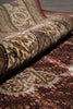 Load image into Gallery viewer, Close-up of a patterned rug with intricate designs.