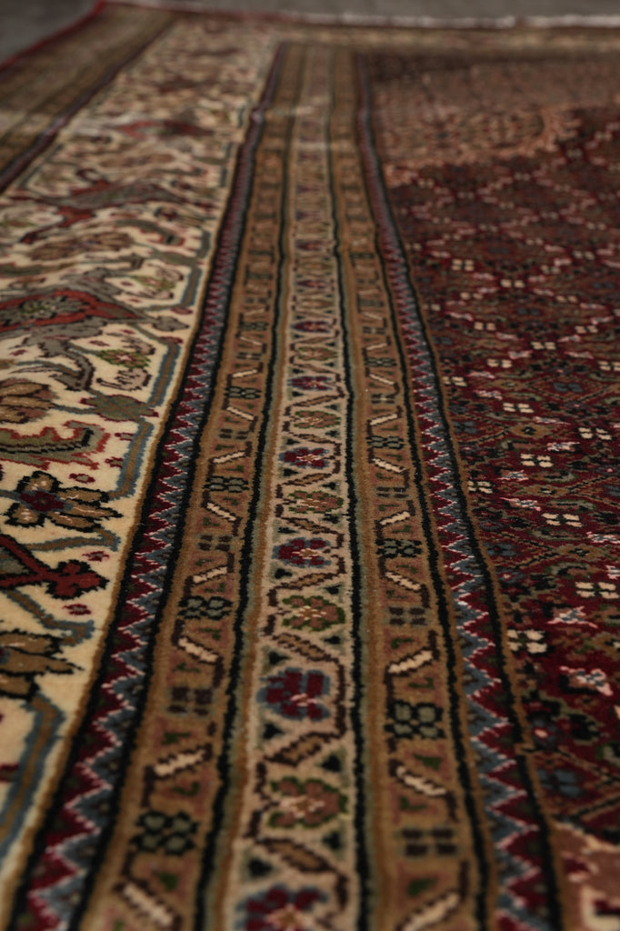 Close-up of a patterned rug with intricate designs.