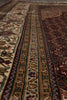 Load image into Gallery viewer, Close-up of a patterned rug with intricate designs.