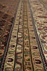 Load image into Gallery viewer, Close-up of a patterned rug with intricate designs.