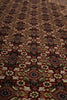 Load image into Gallery viewer, Close-up of a patterned rug with intricate designs.
